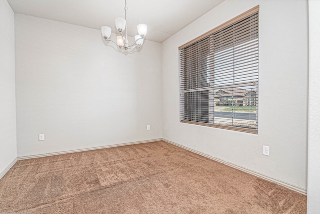 1506 San Miguel Ct, Midland, TX 79705 - carpeted spare room featuring a chandelier and baseboards