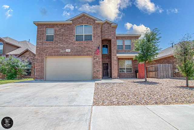 1506 San Miguel Ct, Midland, TX 79705 - traditional-style home with a garage, brick siding, and driveway