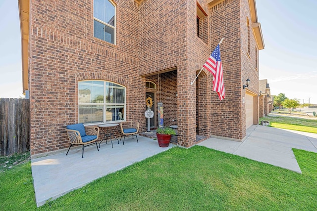 view of patio / terrace with a garage