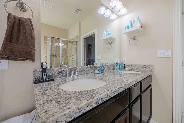 bathroom featuring vanity and walk in shower