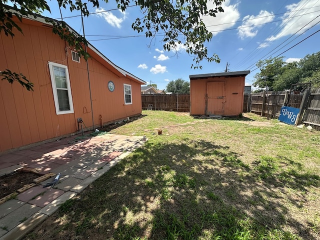 902 W 39th St, Odessa, TX 79764 - fenced backyard with a shed and a patio
