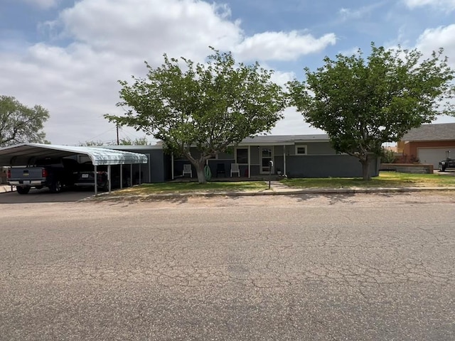 view of front of home featuring a detached carport