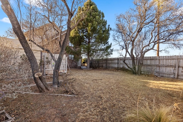 view of yard featuring a fenced backyard