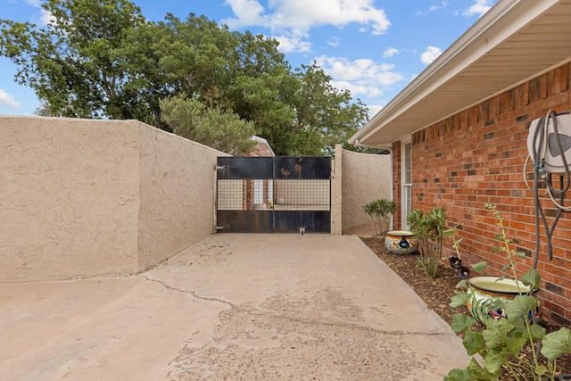 9408 Cromwell Ter, Odessa, TX 79764 - view of patio / terrace featuring fence and a gate