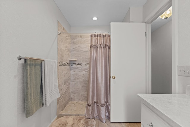 9408 Cromwell Ter, Odessa, TX 79764 - bathroom featuring vanity and a tile shower