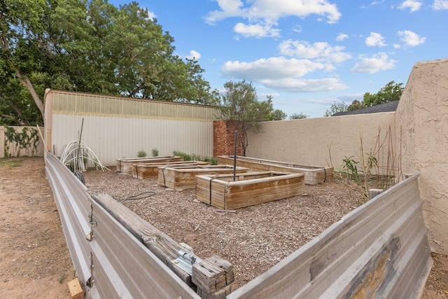 9408 Cromwell Ter, Odessa, TX 79764 - view of yard with fence and a vegetable garden