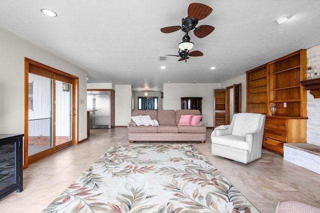 9408 Cromwell Ter, Odessa, TX 79764 - living room featuring visible vents, a ceiling fan, and recessed lighting