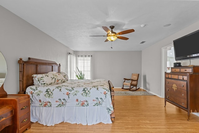 9408 Cromwell Ter, Odessa, TX 79764 - bedroom with baseboards, ceiling fan, visible vents, and light wood-type flooring
