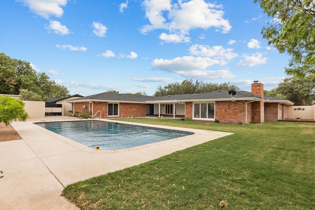 9408 Cromwell Ter, Odessa, TX 79764 - pool with a patio area, fence, and a lawn