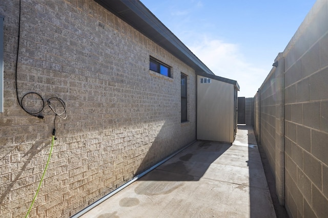 view of property exterior with fence