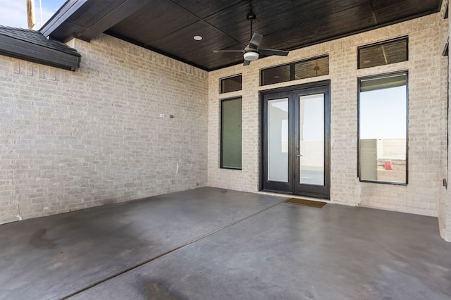 view of patio featuring a ceiling fan and french doors