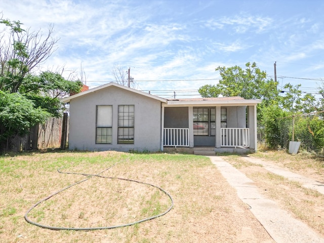 1431 S Alleghaney Ave, Odessa, TX 79761 - view of front of house with stucco siding and covered porch