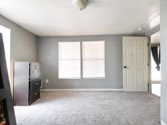 1431 S Alleghaney Ave, Odessa, TX 79761 - unfurnished bedroom with carpet and baseboards
