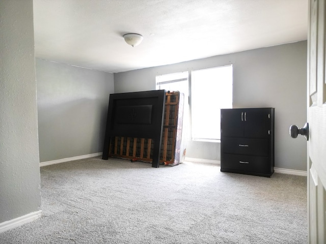 1431 S Alleghaney Ave, Odessa, TX 79761 - carpeted bedroom featuring baseboards