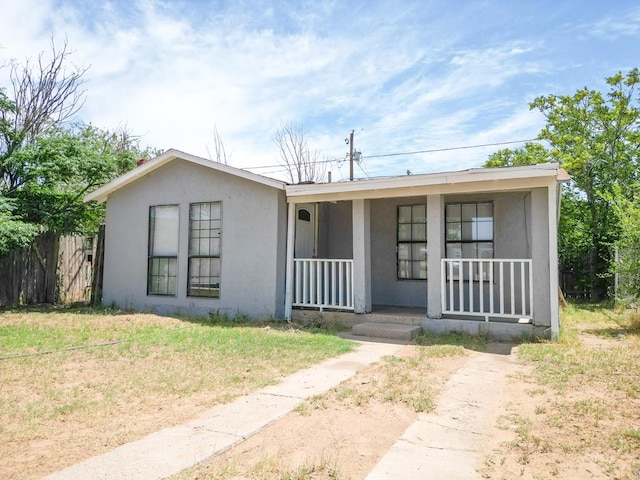 1431 S Alleghaney Ave, Odessa, TX 79761 - view of front facade featuring stucco siding and covered porch