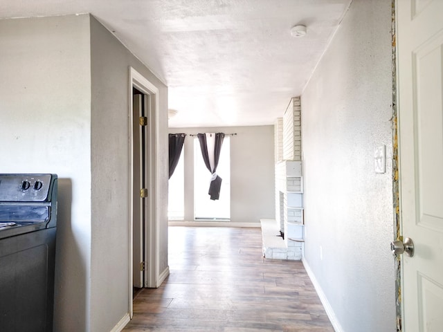 1431 S Alleghaney Ave, Odessa, TX 79761 - corridor featuring wood finished floors and baseboards