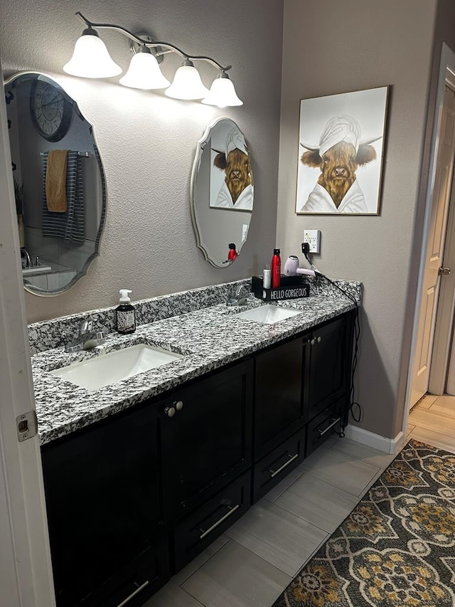 bathroom featuring double vanity
