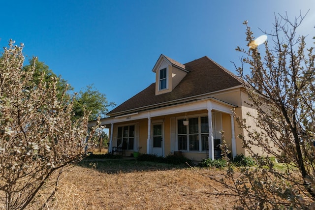 603 N 11th St, Alpine, TX 79830 - view of front of property featuring roof with shingles and stucco siding