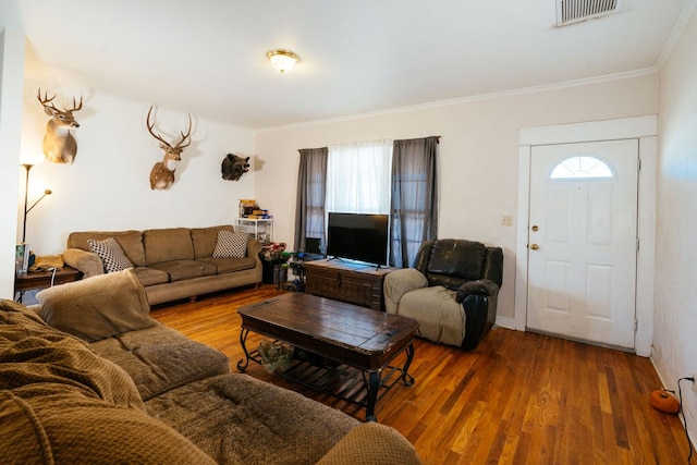603 N 11th St, Alpine, TX 79830 - living room featuring ornamental molding and wood finished floors