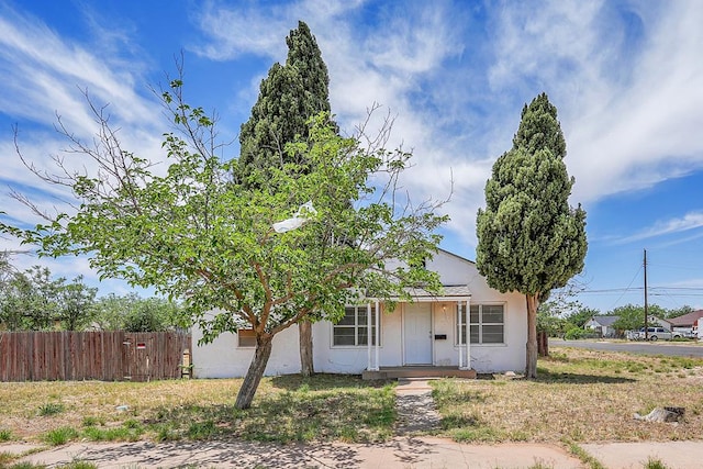 view of front of home with fence