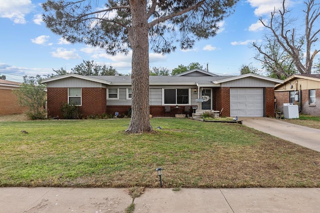 1306 Douglas Dr, Odessa, TX 79762 - ranch-style home featuring brick siding, concrete driveway, a garage, and a front lawn