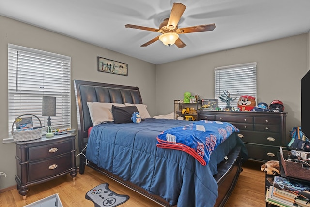 1306 Douglas Dr, Odessa, TX 79762 - bedroom with wood finished floors and ceiling fan