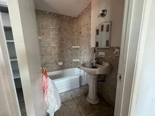 bathroom with tile patterned floors