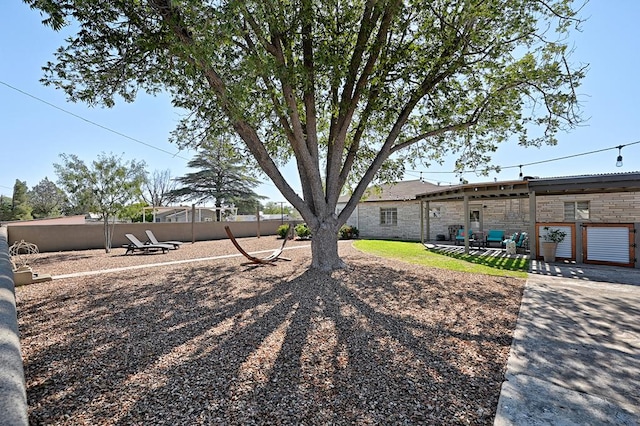 view of yard with a patio area