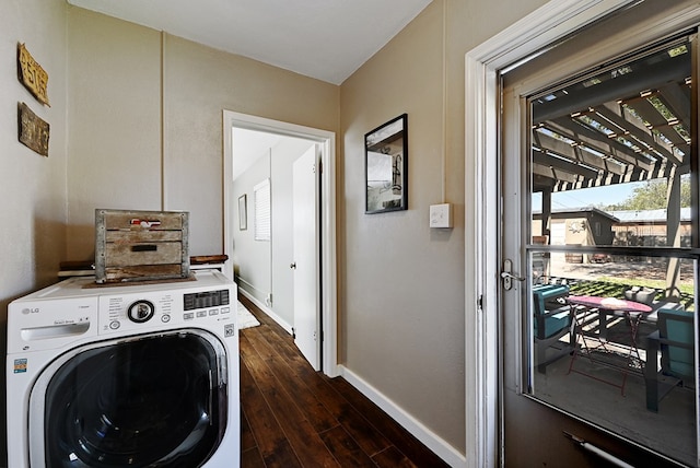 laundry room with dark hardwood / wood-style flooring and washer / dryer