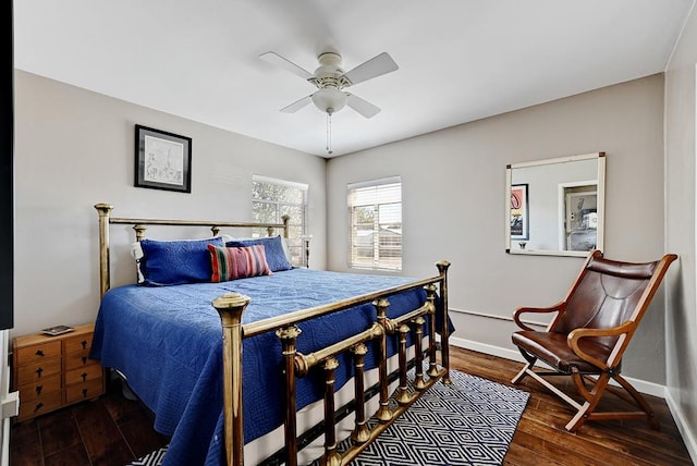 bedroom featuring ceiling fan and dark hardwood / wood-style flooring