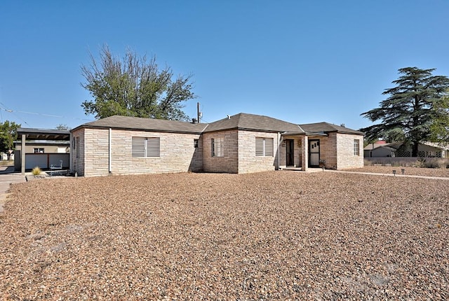 view of front of property with a carport