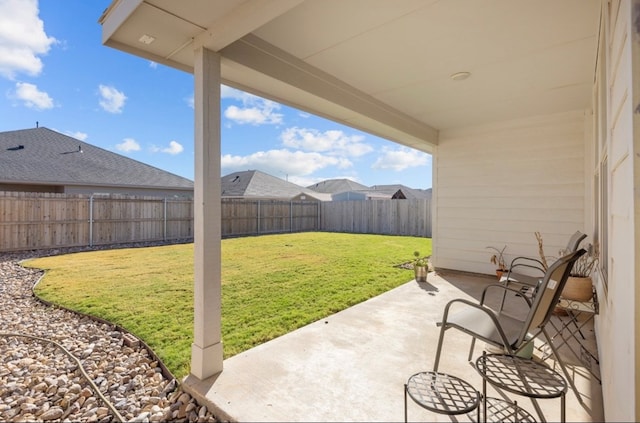 7018 Adenium Rd, Odessa, TX 79765 - fenced backyard featuring a patio
