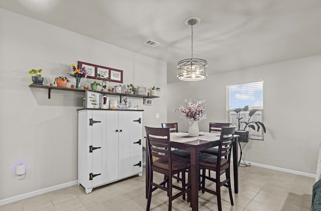 7018 Adenium Rd, Odessa, TX 79765 - dining space featuring a chandelier and light tile patterned floors