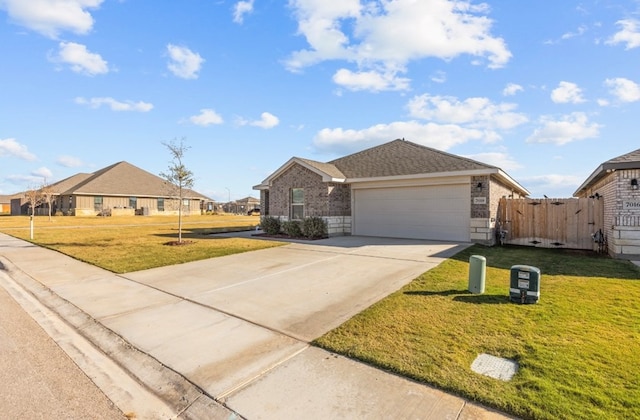 7018 Adenium Rd, Odessa, TX 79765 - single story home with concrete driveway, brick siding, and a garage