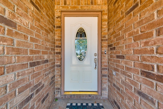 8625 Harvard Ave, Odessa, TX 79765 - view of exterior entry featuring brick siding