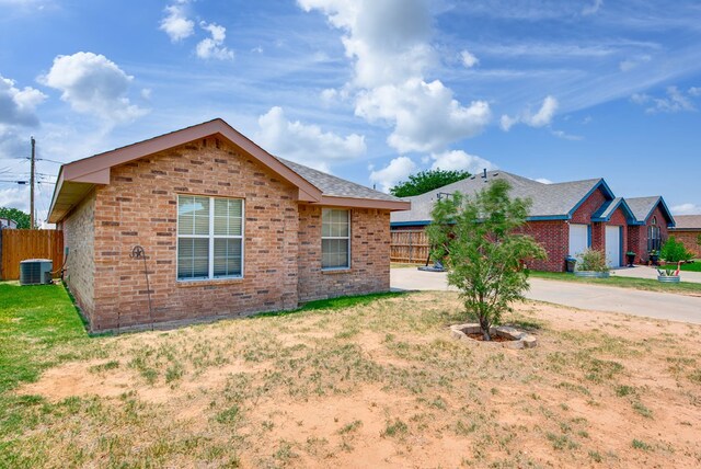 8625 Harvard Ave, Odessa, TX 79765 - single story home with brick siding
