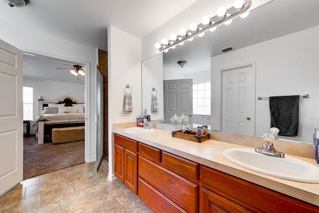8625 Harvard Ave, Odessa, TX 79765 - full bathroom with ensuite bath, double vanity, and ceiling fan