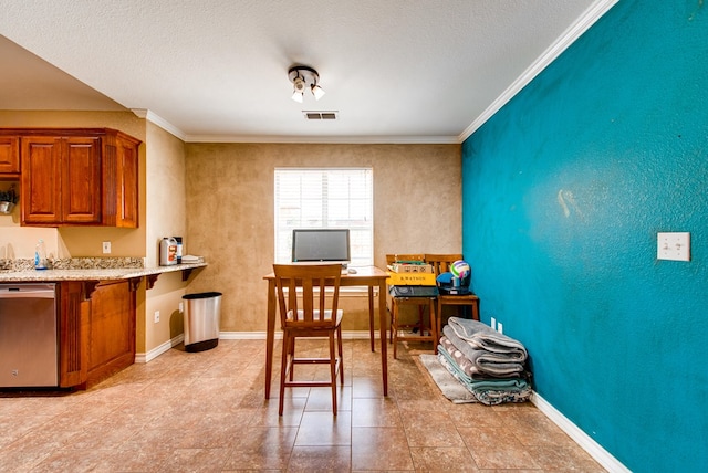 8625 Harvard Ave, Odessa, TX 79765 - dining space featuring ornamental molding and a textured ceiling