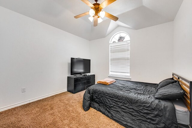 8625 Harvard Ave, Odessa, TX 79765 - bedroom with carpet floors, vaulted ceiling, and ceiling fan