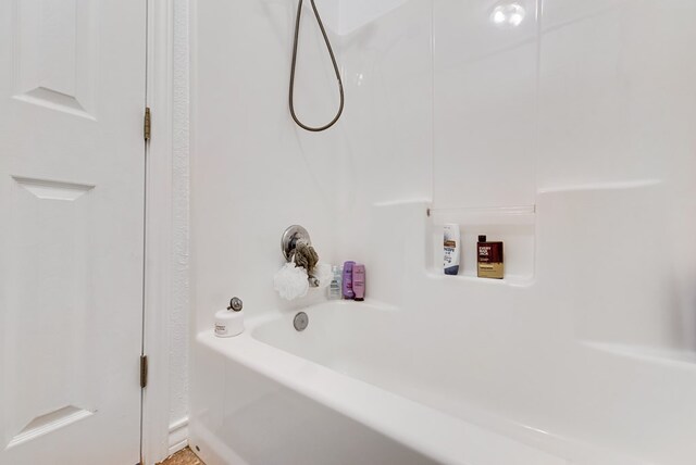 8625 Harvard Ave, Odessa, TX 79765 - bathroom with bathing tub / shower combination
