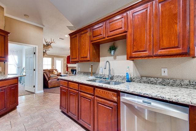 8625 Harvard Ave, Odessa, TX 79765 - kitchen with dishwasher, ornamental molding, light stone countertops, open floor plan, and brown cabinetry