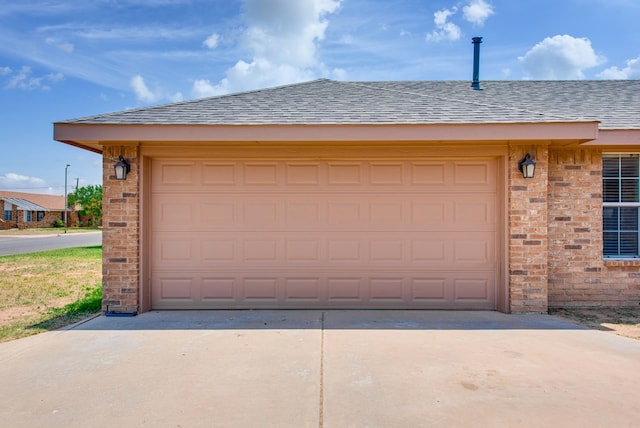 8625 Harvard Ave, Odessa, TX 79765 - garage featuring driveway