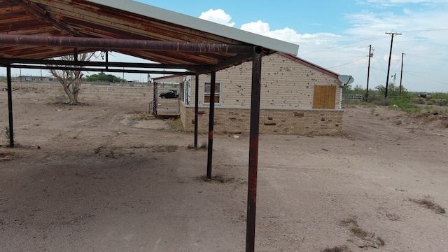 341 Bass St, Crane, TX 79731 - view of yard with a carport
