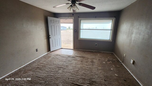 341 Bass St, Crane, TX 79731 - carpeted empty room featuring ceiling fan and a textured ceiling