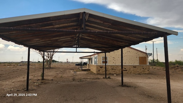 341 Bass St, Crane, TX 79731 - view of car parking with a carport