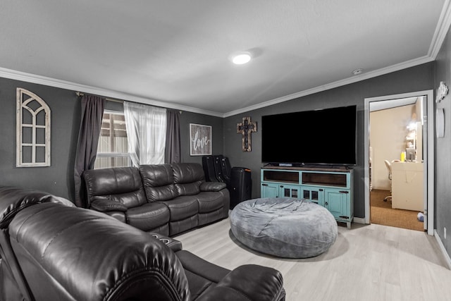 living room featuring crown molding and wood finished floors