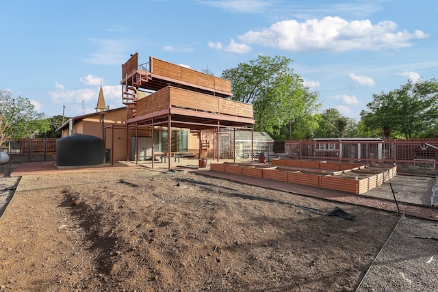 401 E Sul Ross Ave, Alpine, TX 79830 - rear view of property with a patio and a wooden deck