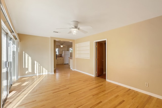401 E Sul Ross Ave, Alpine, TX 79830 - empty room with a ceiling fan, light wood-style flooring, and baseboards
