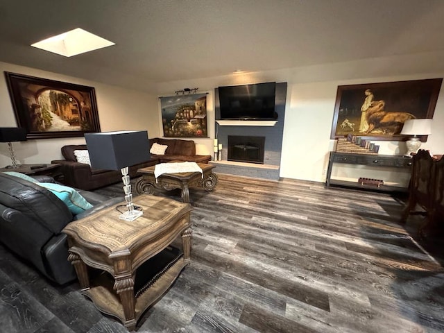 3206 Haynes Dr, Midland, TX 79705 - living area with a large fireplace, a skylight, and wood finished floors