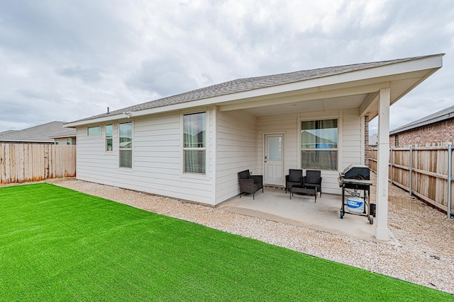 6205 Globe Life Ct, Odessa, TX 79762 - back of property with a patio and a fenced backyard